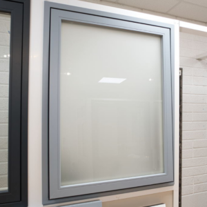 Modern AluClad top-hung sash window with an outward-opening design, providing excellent ventilation and durability.